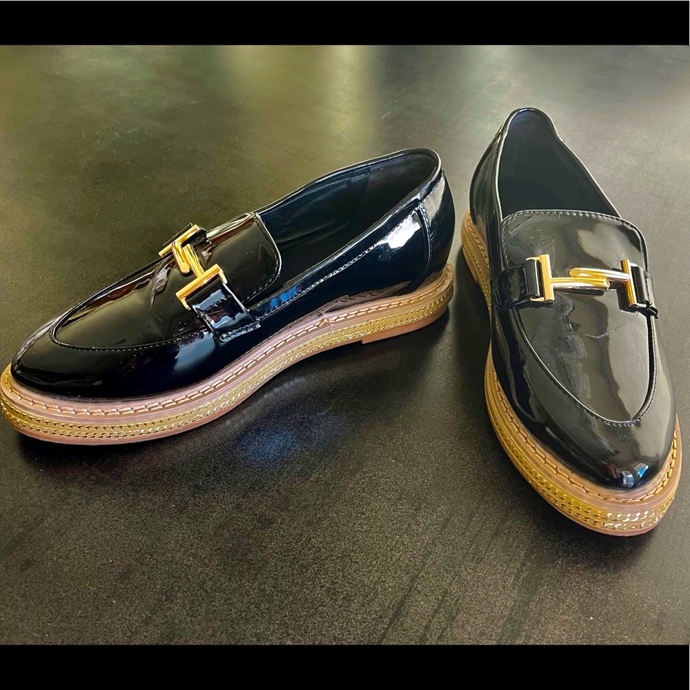 Black patent loafer with slight flatform